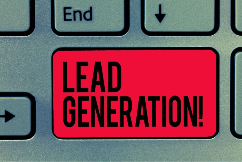 A close-up of a computer keyboard with a large, red key that says 'LEAD GENERATION!' in bold letters
