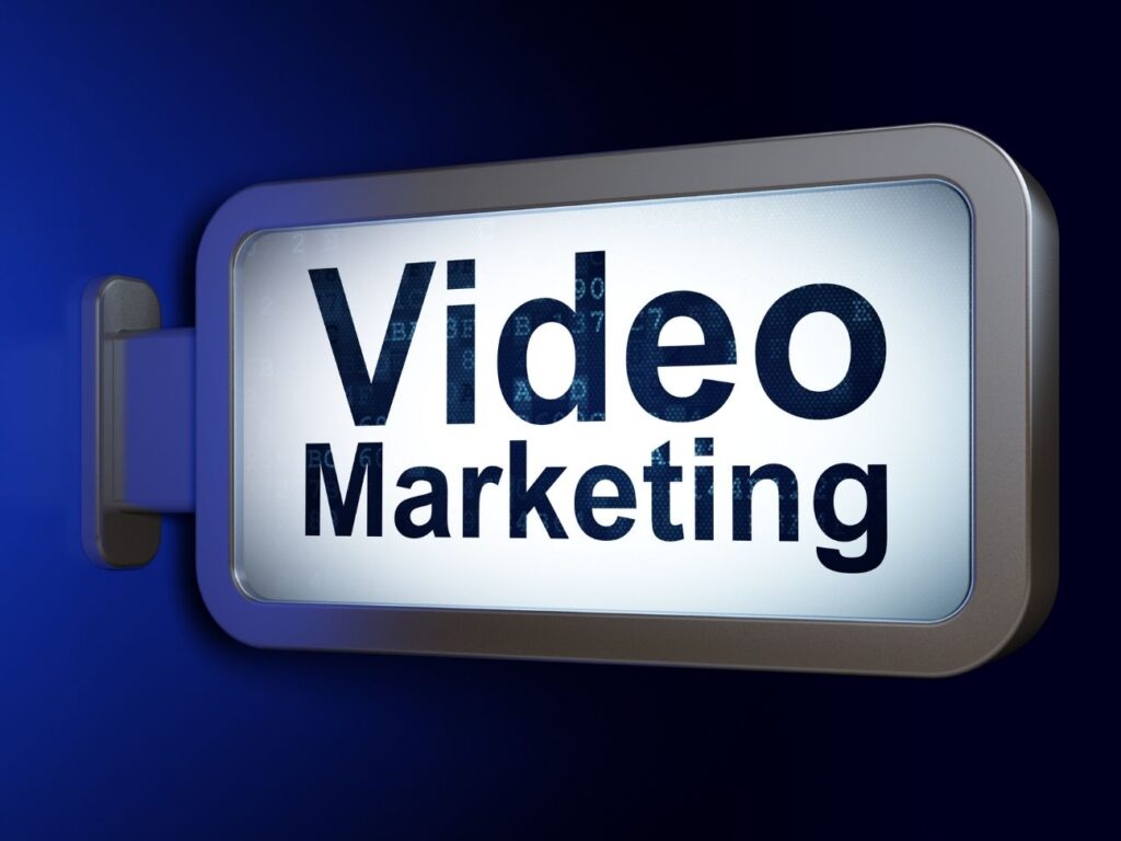 3D illuminated sign displaying the words "Video Marketing" against a dark blue background, representing digital advertising and promotional strategies.
