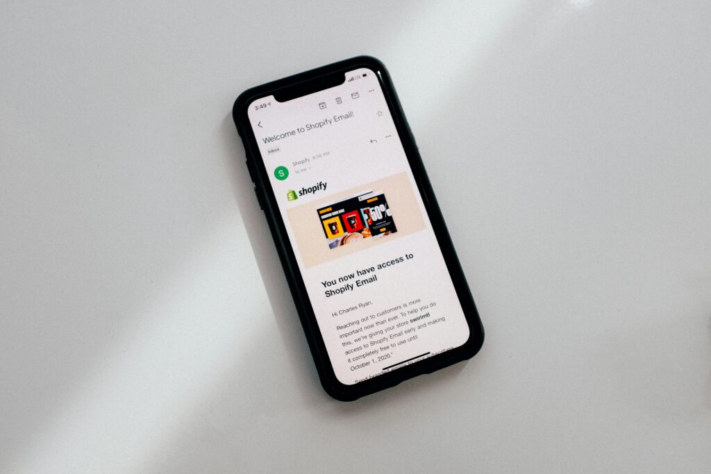 Smartphone screen showing Shopify Email welcome message