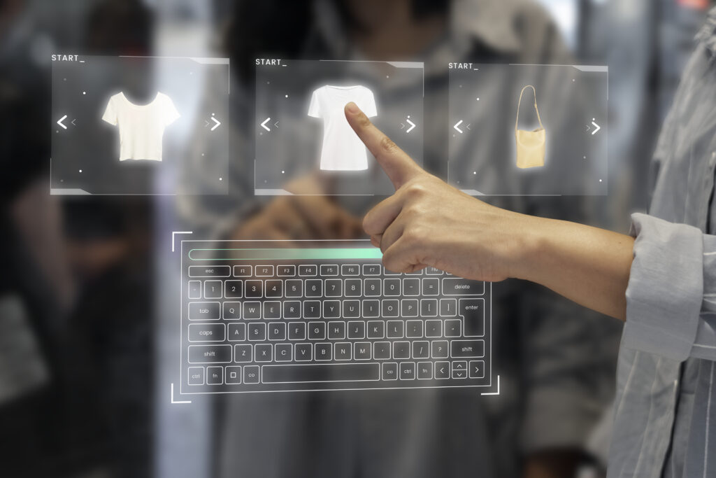 Person interacting with a virtual touchscreen interface displaying online clothing and accessory options, representing futuristic eCommerce or WooCommerce shopping experience