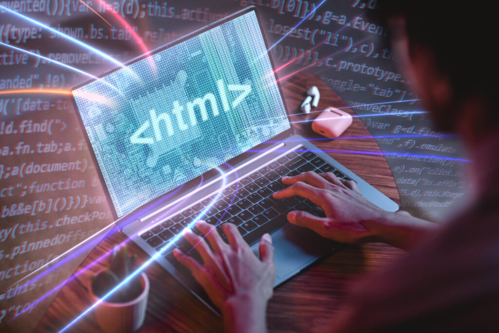 A web developer coding on a laptop with a stylized <html> tag glowing brightly on the screen